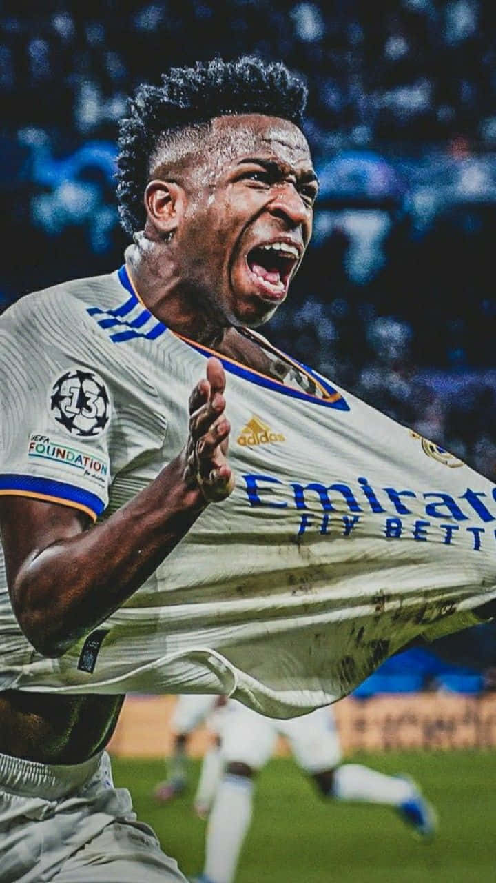 Download Vinicius Jr Celebration Real Madrid Wallpaper | Wallpapers.com