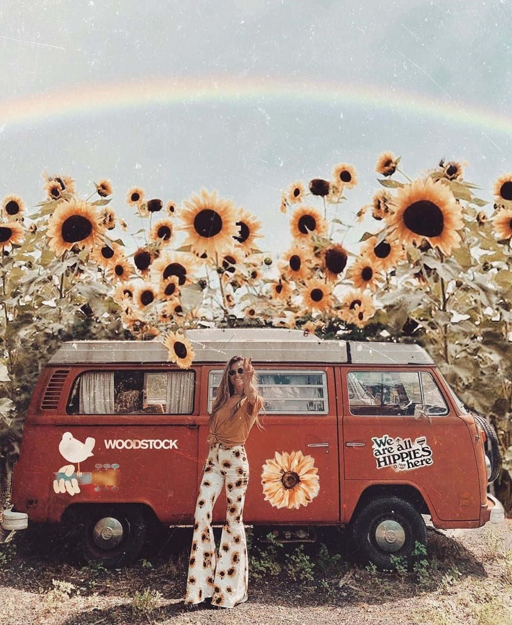 A Woman Standing Next To A Vw Van With Sunflowers In The Background