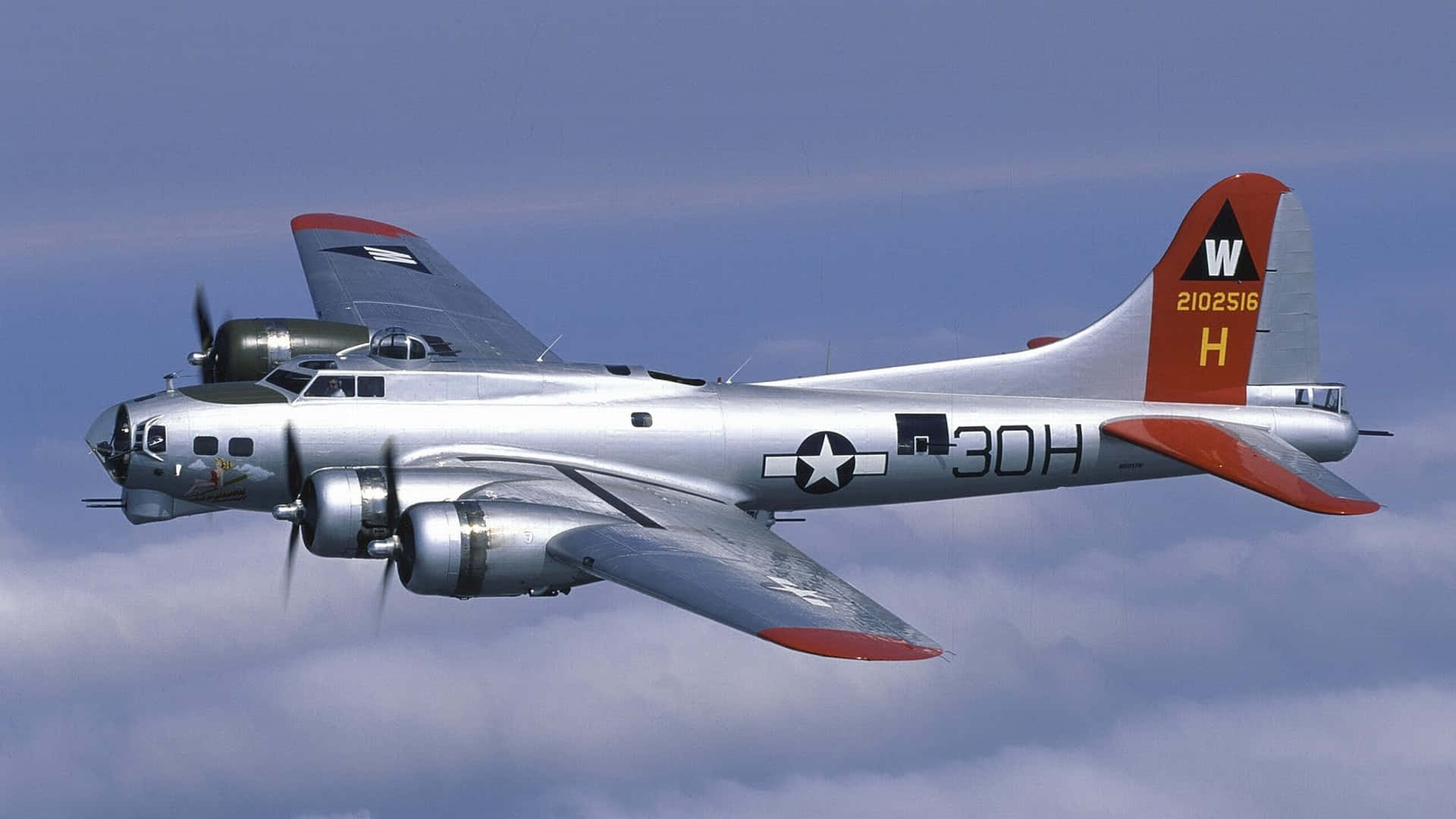 Vintage Airplane Soaring In The Skies Wallpaper