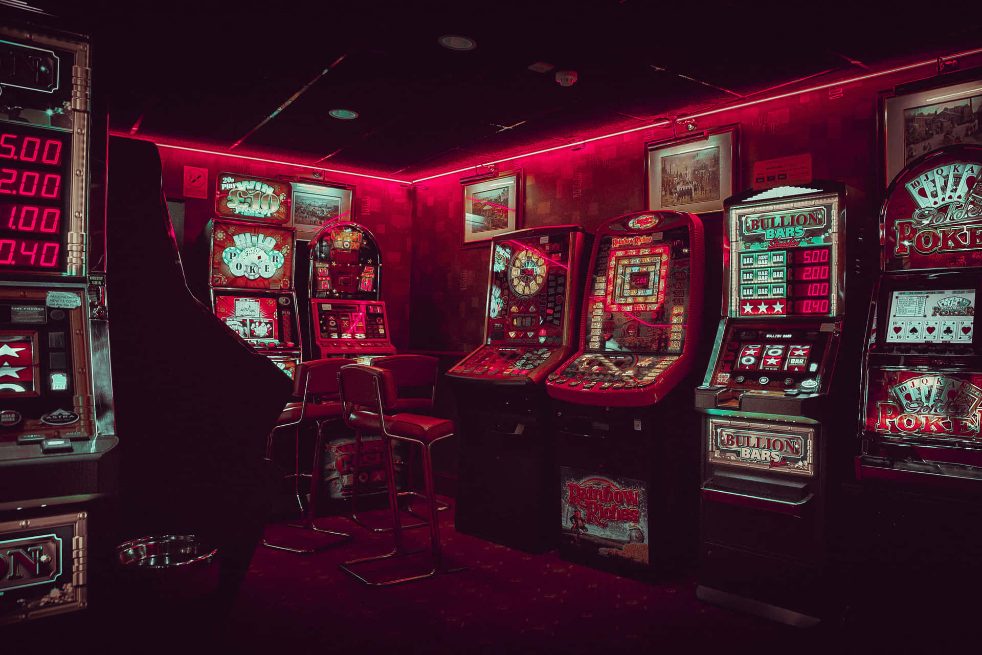 Vintage Arcade Machines Neon Glow Wallpaper