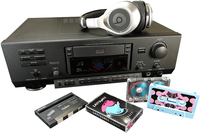 Vintage Audio Setupwith Cassettesand Headphones PNG