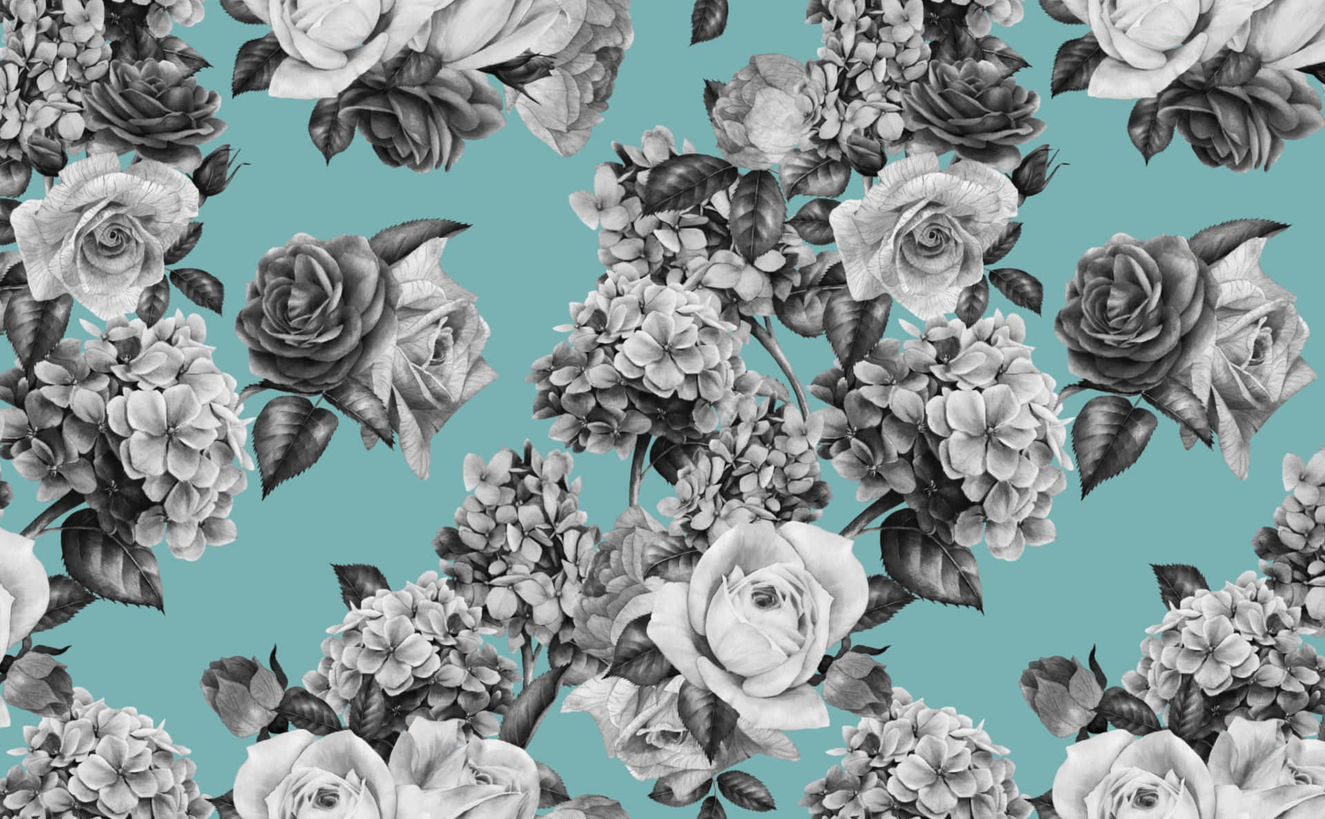 a floral pattern in teal and black