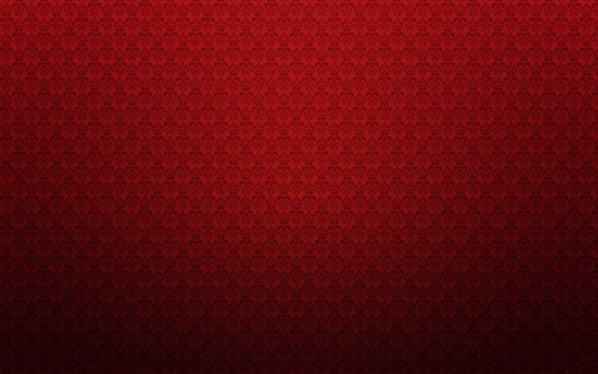 red wallpaper with a pattern of small circles