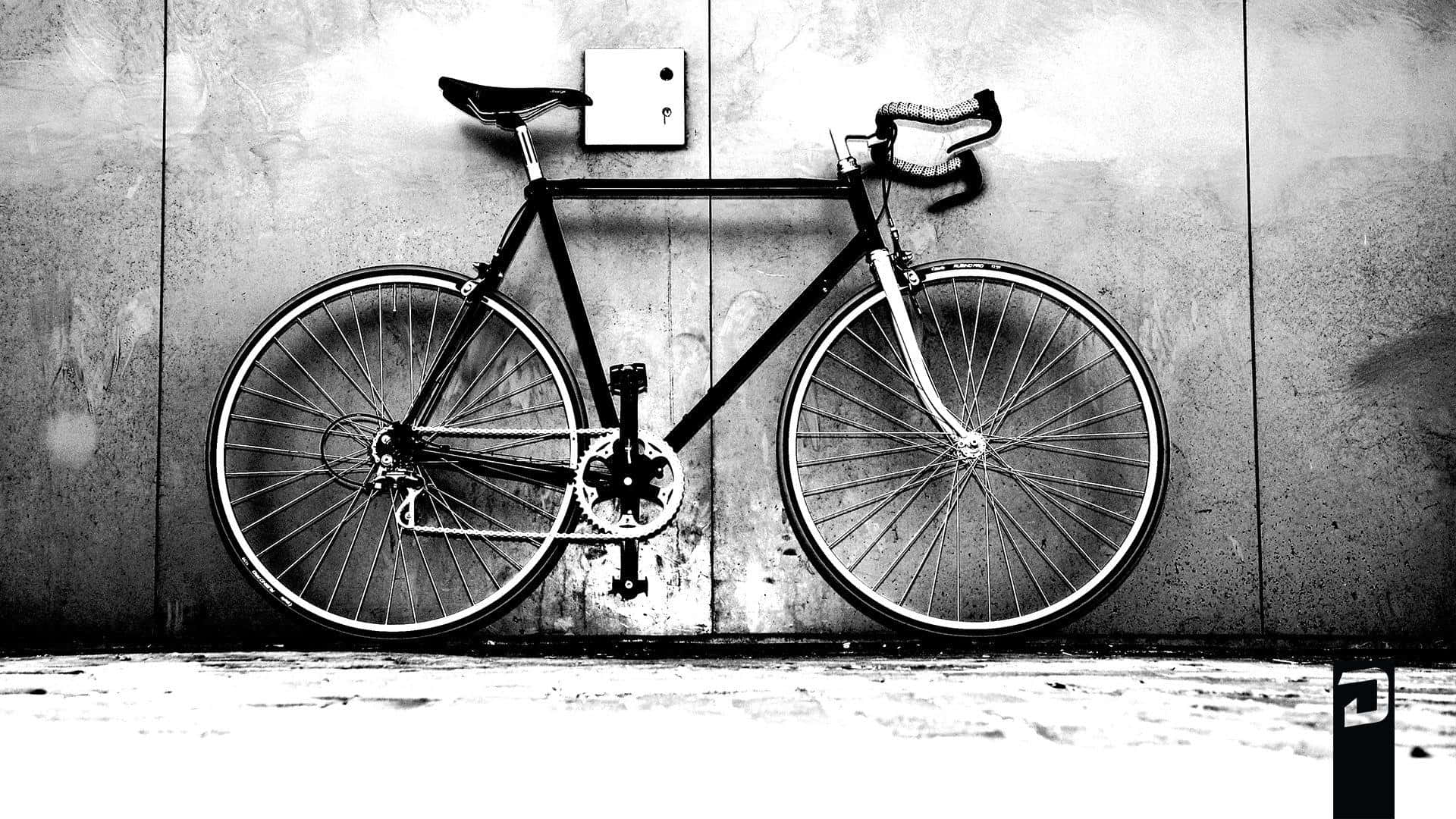 Vintage Beauty Bicycle Parked Against Pale Wall Wallpaper