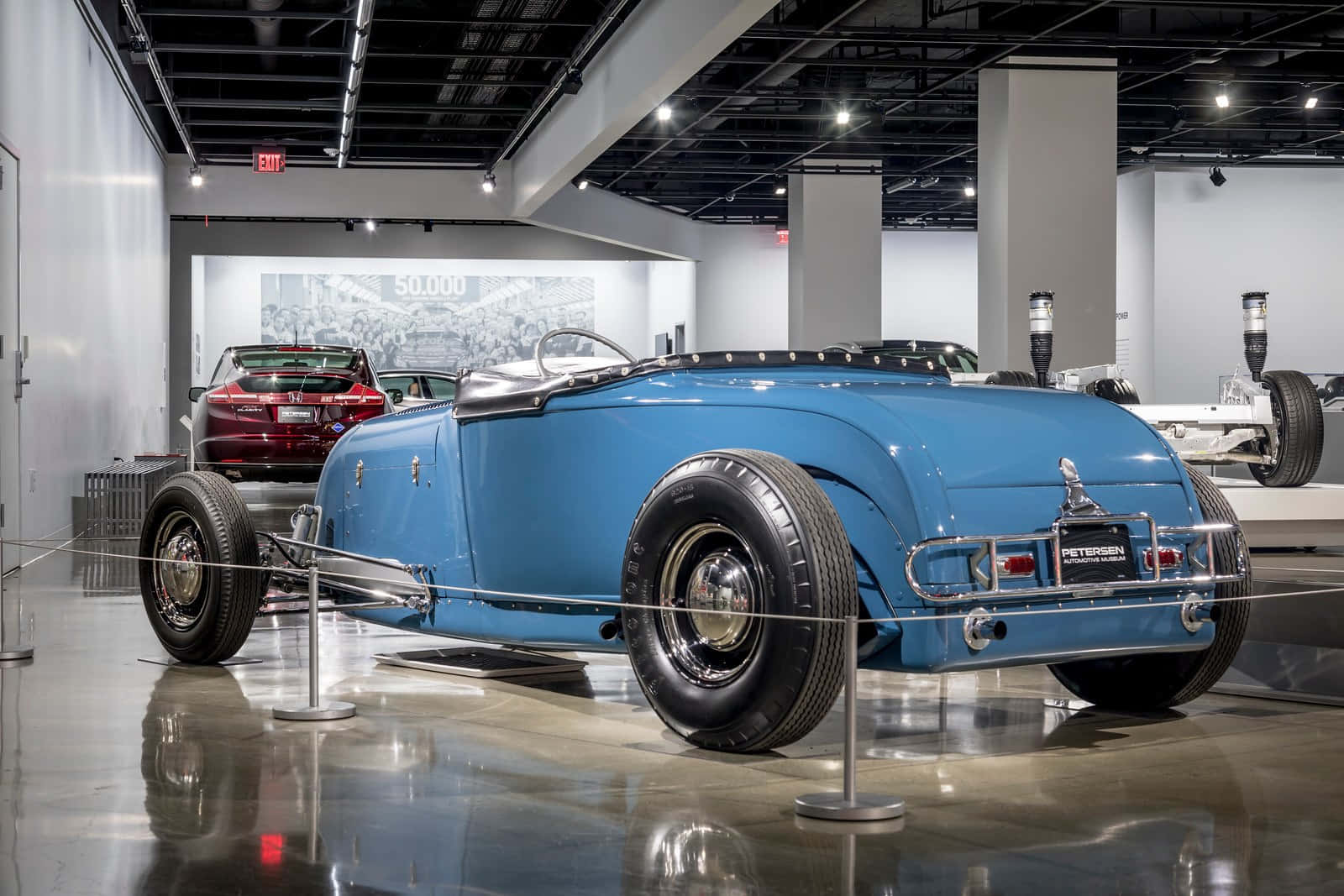 Vintage Blue Car Exhibit Petersen Automotive Museum Wallpaper
