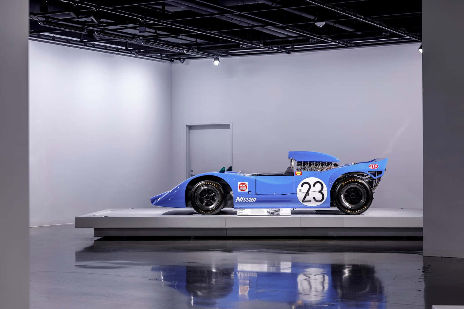 Vintage Blue Racecar Exhibit Petersen Museum Wallpaper