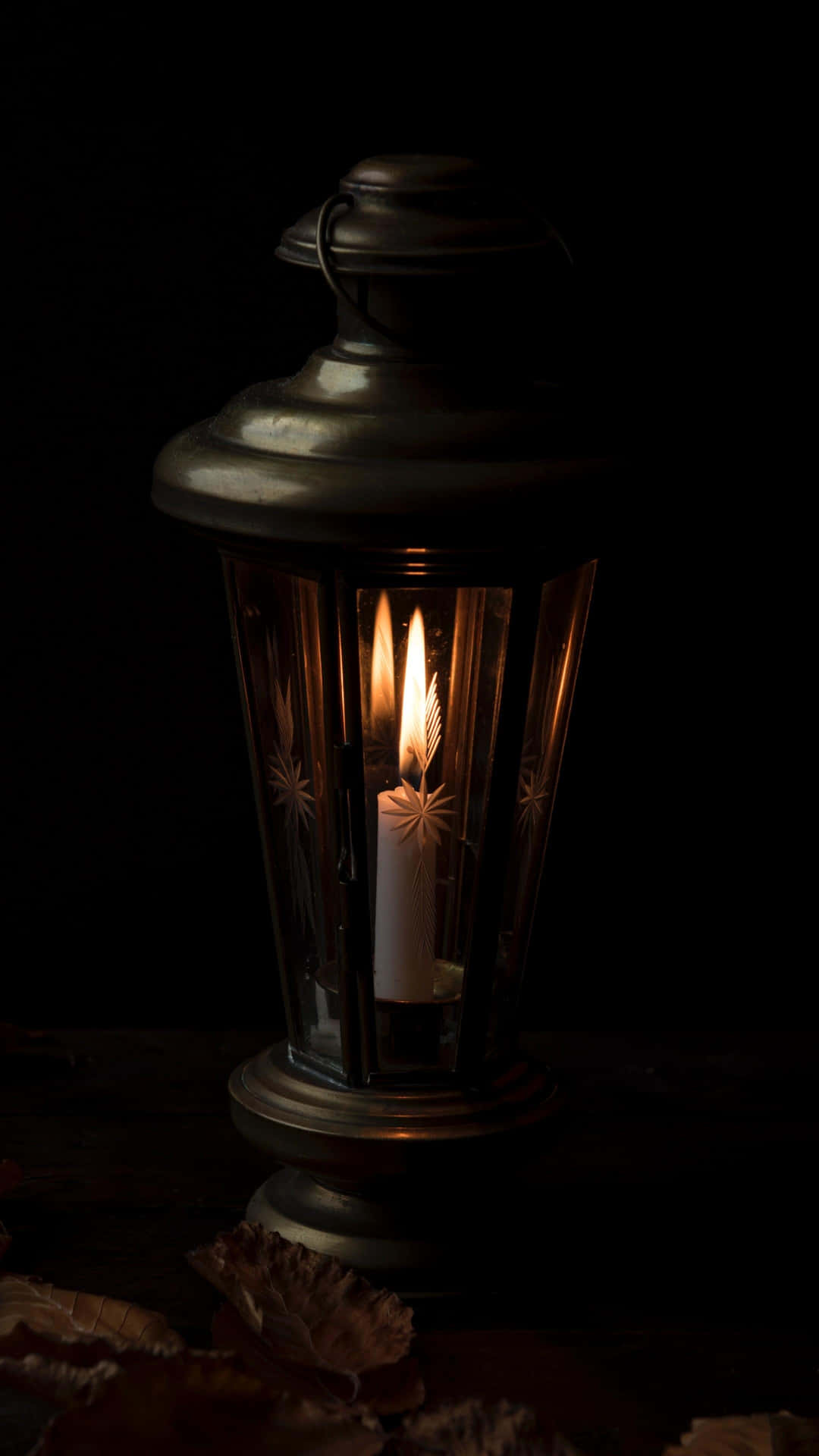 Vintage Candle Lantern Glowingin Dark Wallpaper
