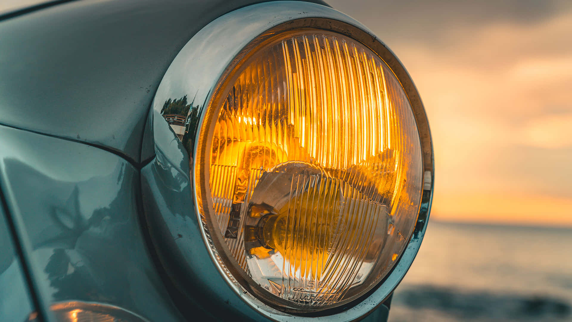 Vintage Auto Koplamp Bij Zonsondergang Achtergrond