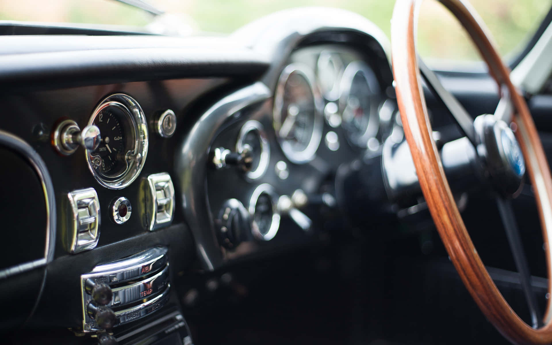 Vintage Car Interior Steering Wheeland Dashboard Wallpaper