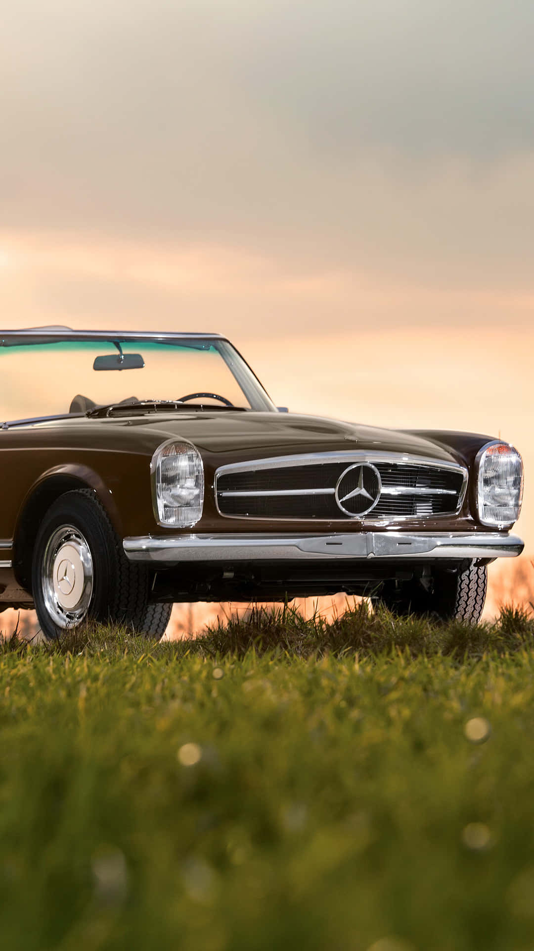 Get Ready to Cruise in Style with this Vintage Car iPhone Wallpaper