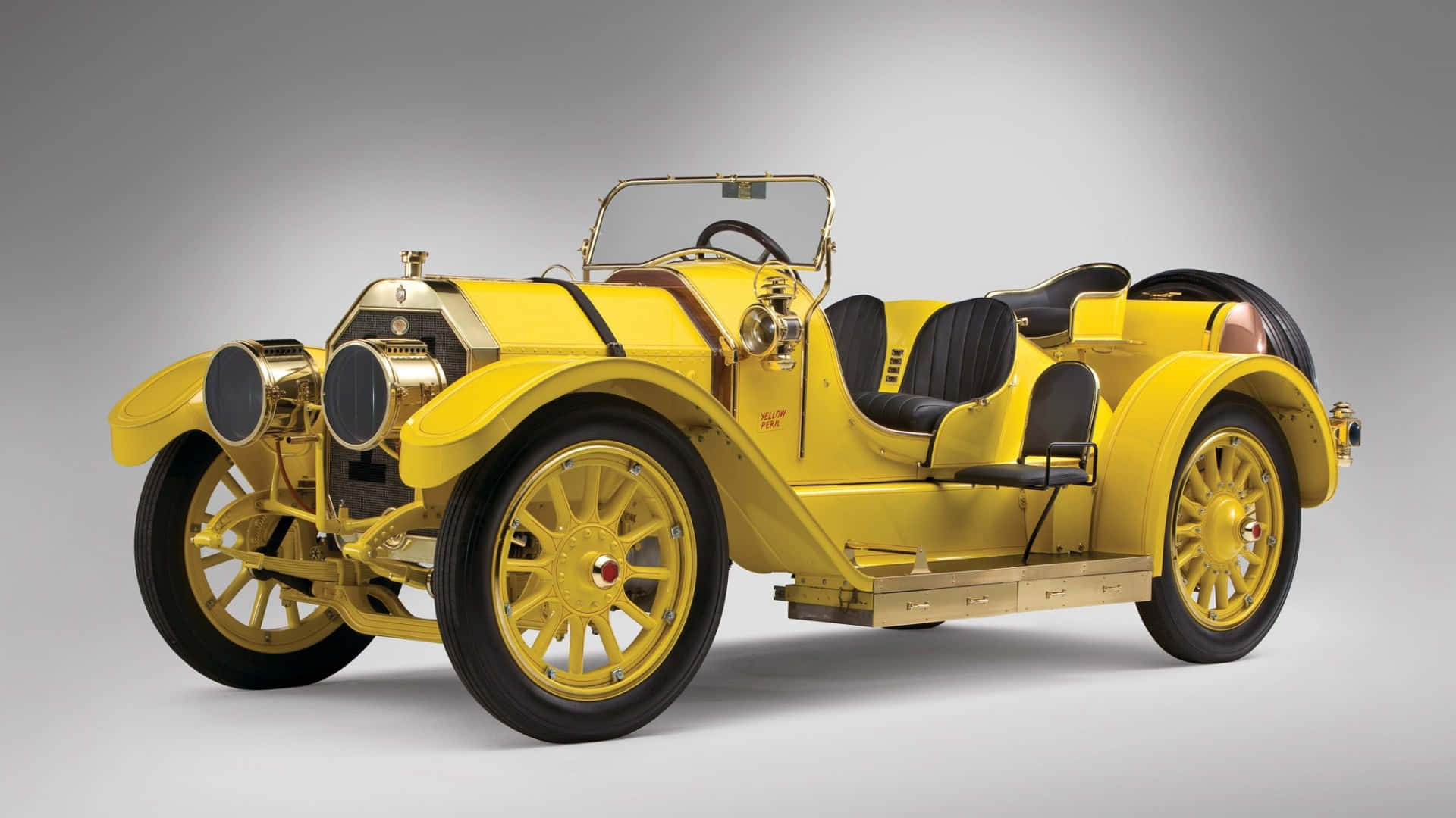 Luksuriøse gule vintage bilbilleder pynte din skærm.