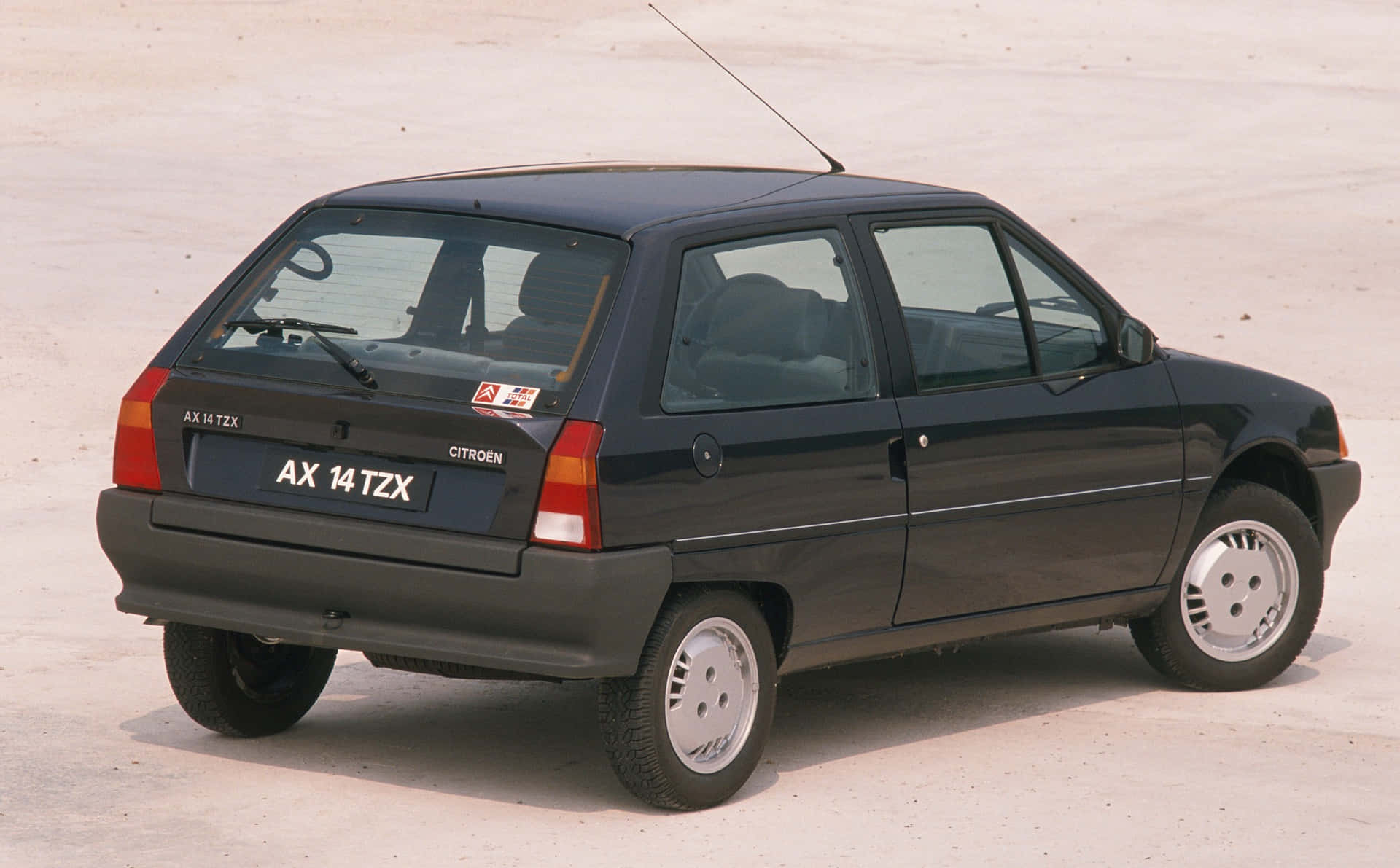 Vintage Citroen Ax On A Country Road Wallpaper