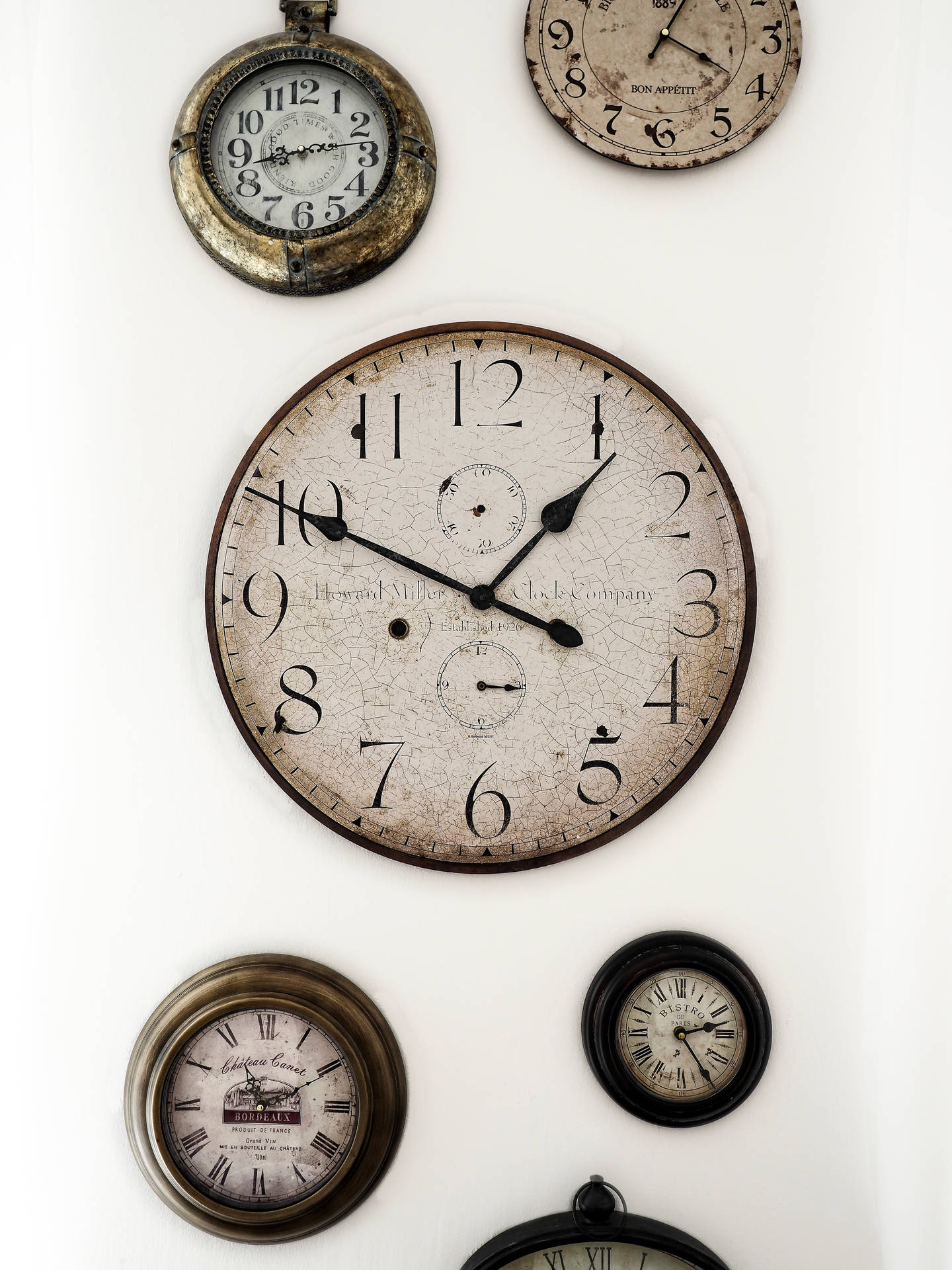 Timeless Elegance - A Trio of Antique Clocks Wallpaper