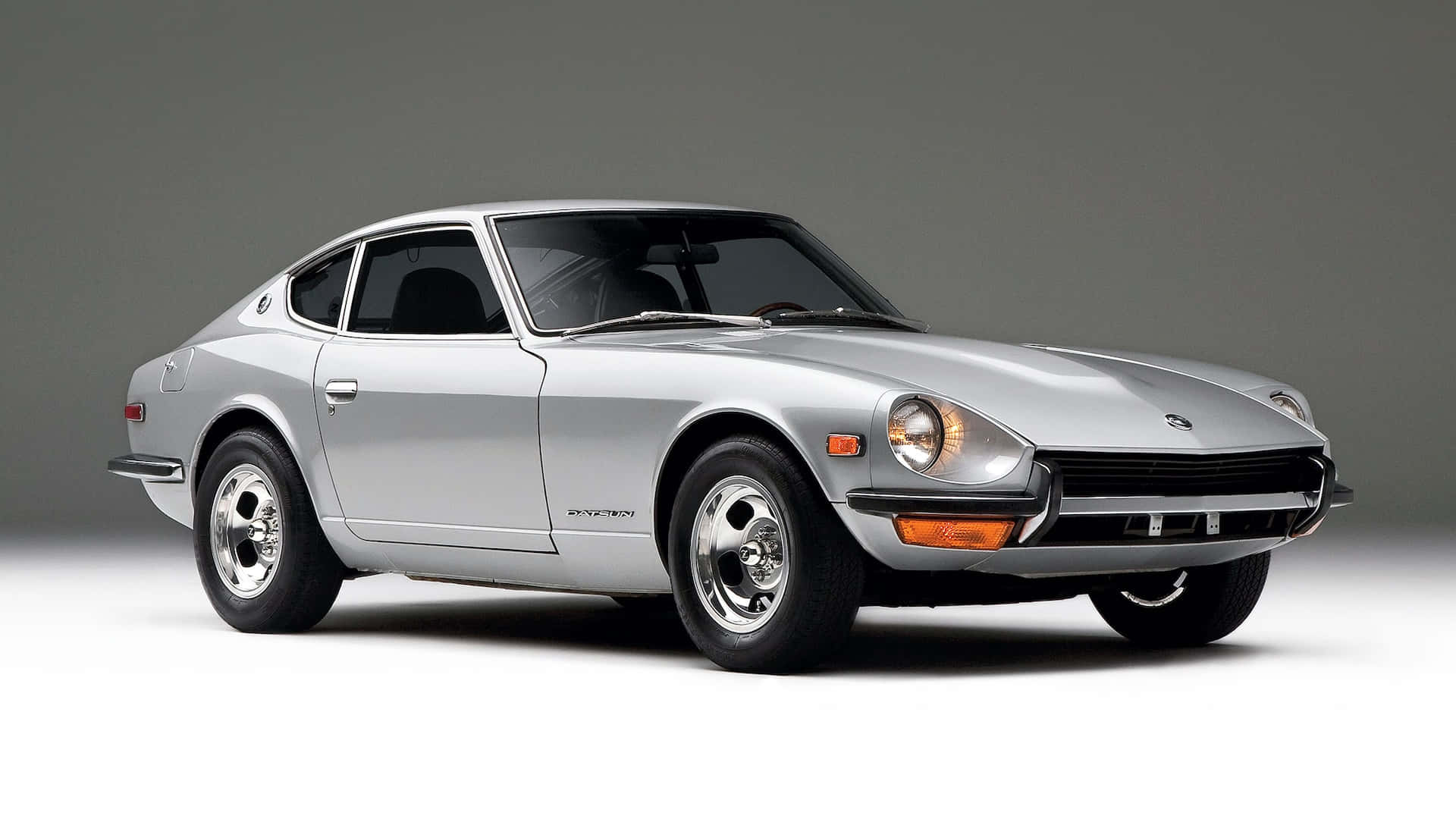 Vintage Datsun 240z Kirkkaassa Punaisessa Taustakuva