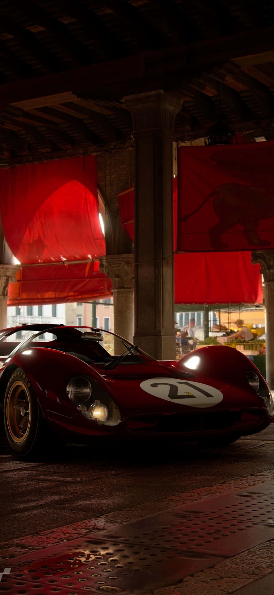 A Red Sports Car Parked Under A Red Canopy Wallpaper