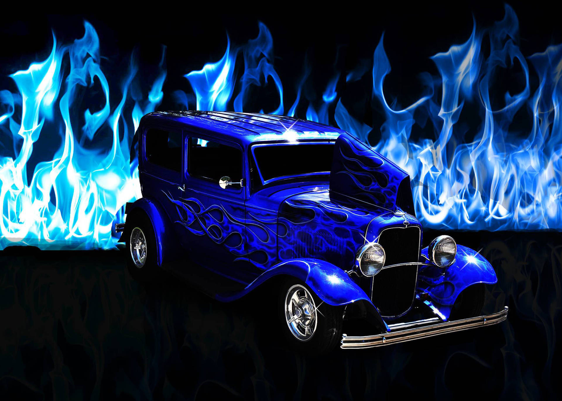 Vibrant Blue Flames Engulfing a Vintage Ford Wallpaper