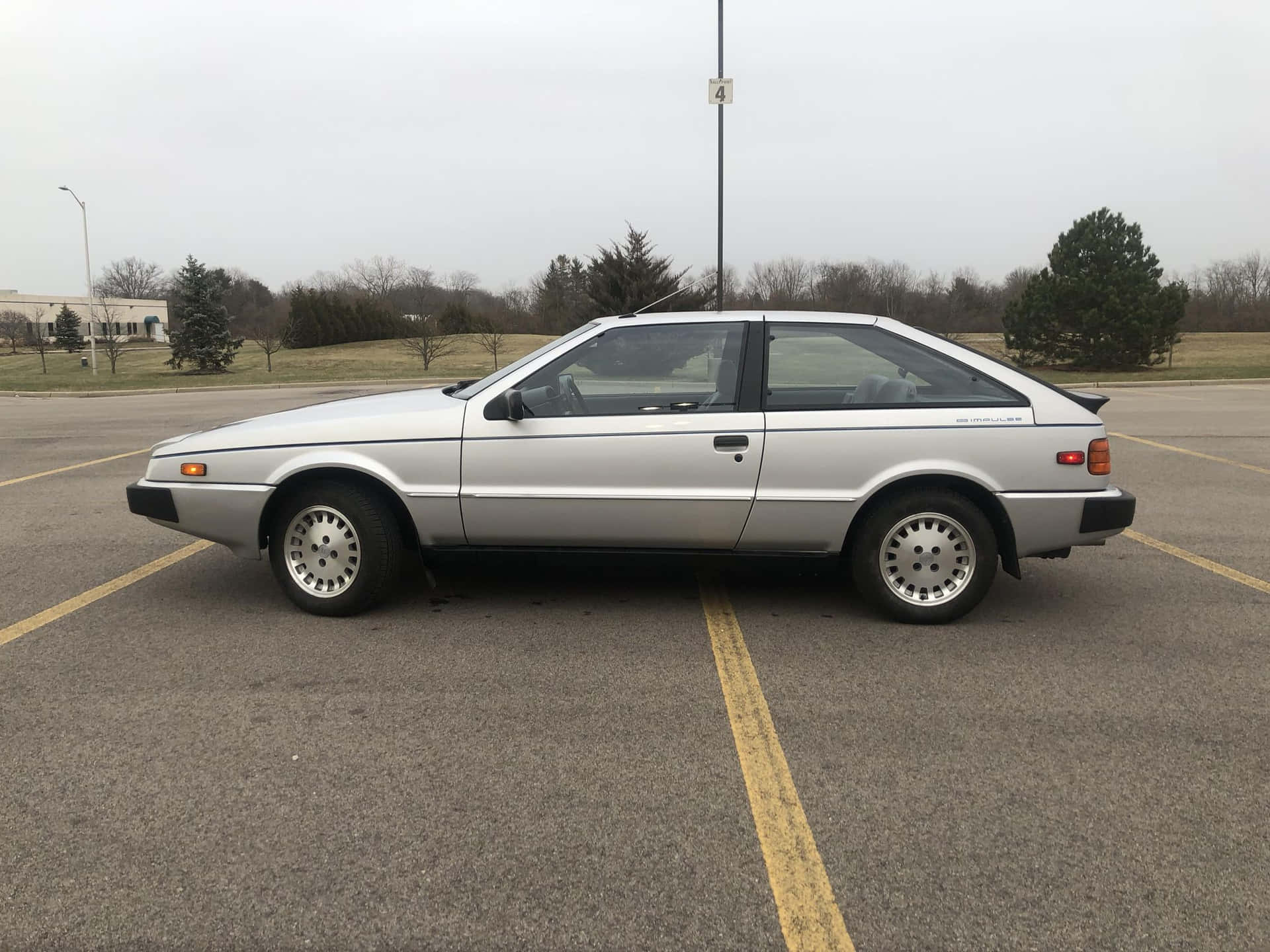 Vintage Isuzu Impulse In Pristine Condition Wallpaper