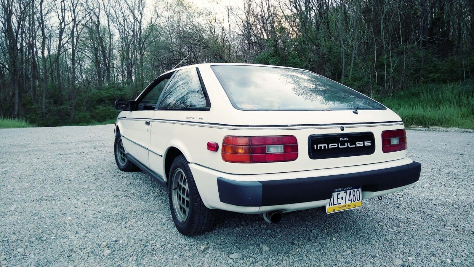 Vue Arrière De L'isuzu Impulse Vintage Fond d'écran