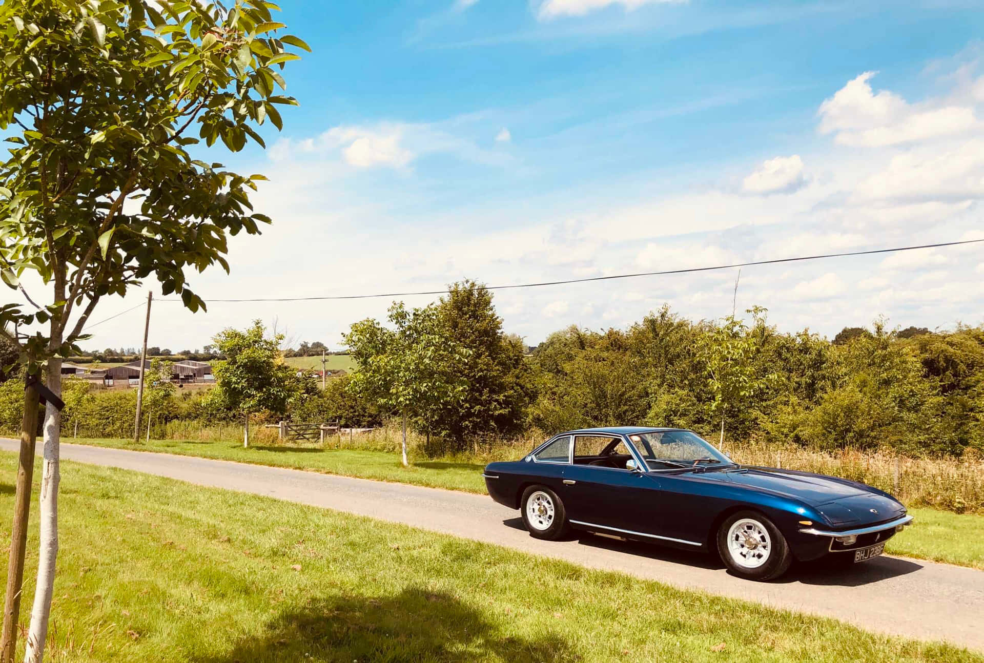 Vintage Lamborghini Islero Platteland Achtergrond