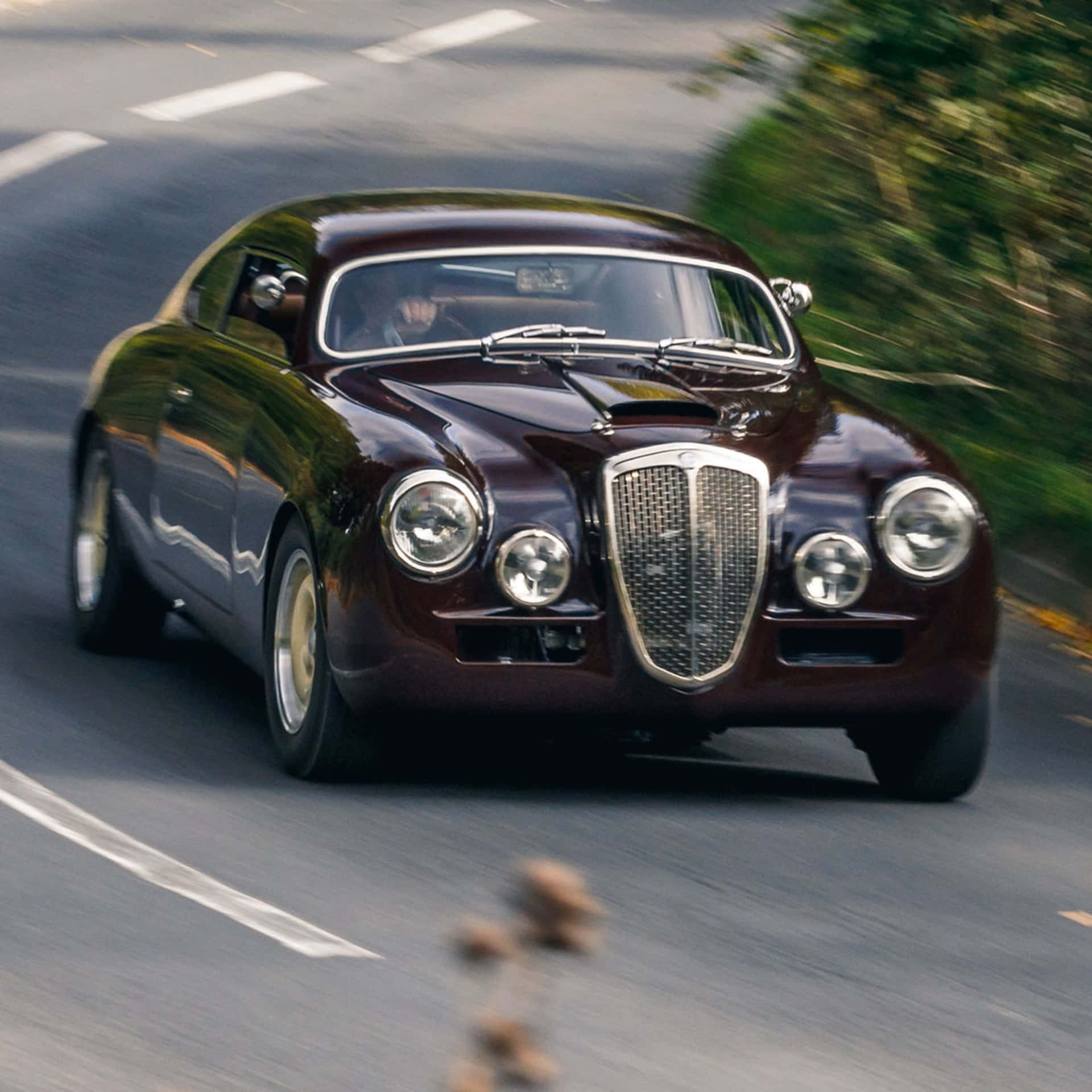 Vintage Lancia Aurelia Liikkeessä Taustakuva