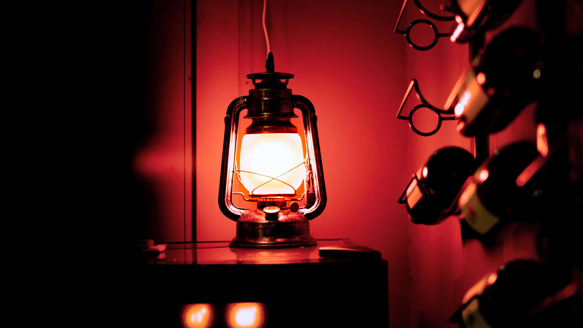 Vintage Lantern Glowing Warmly Wallpaper