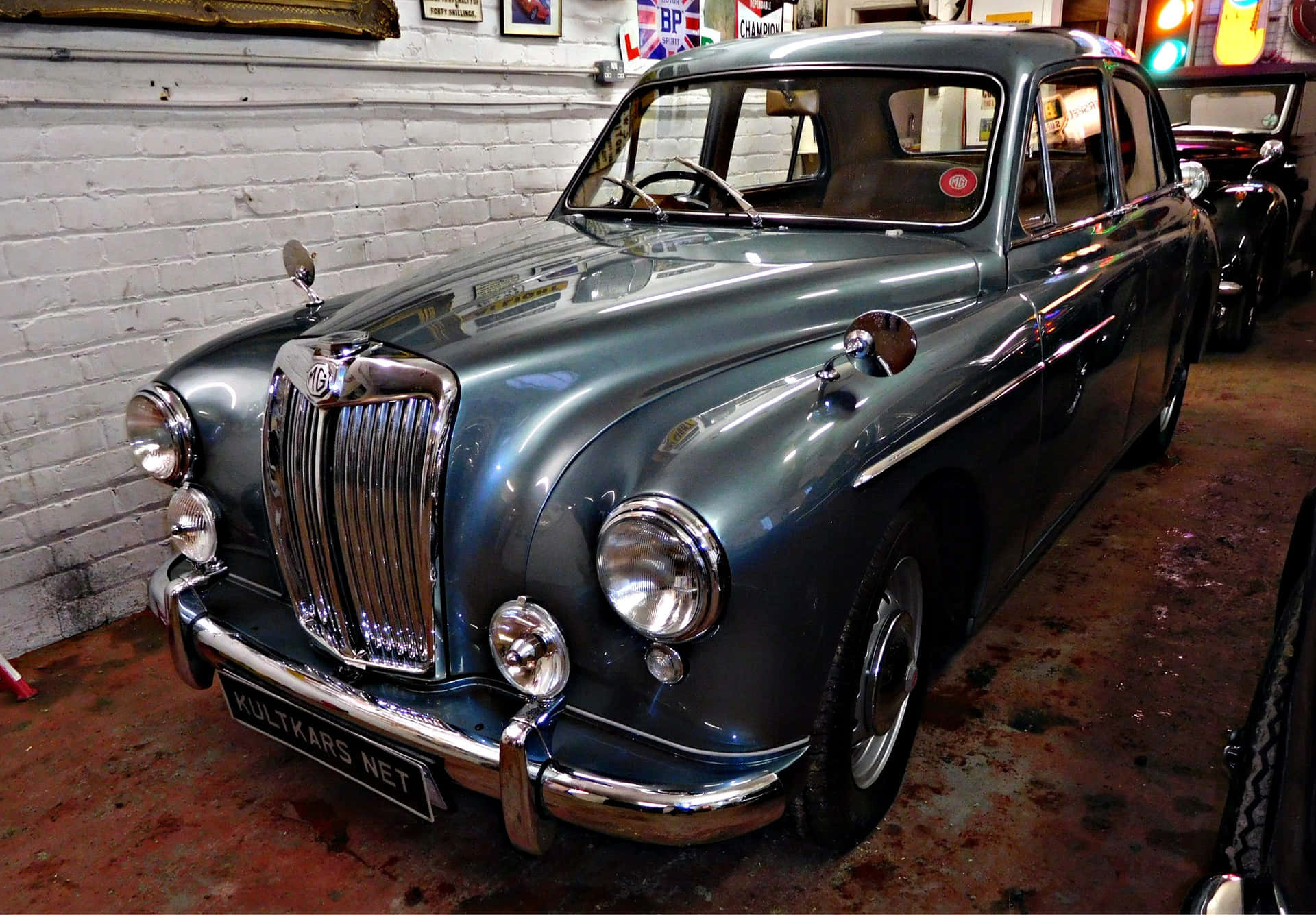 Vintage Mg Magnette Cruising Down The Picturesque Route Wallpaper