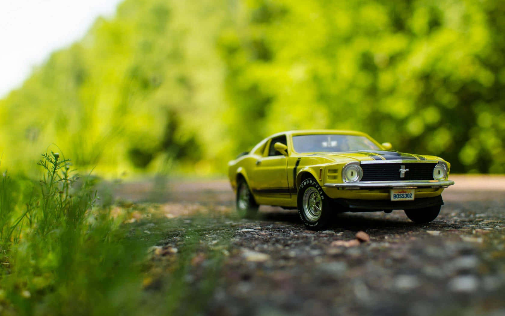 Vintage Mustang Toy Car Outdoors Wallpaper