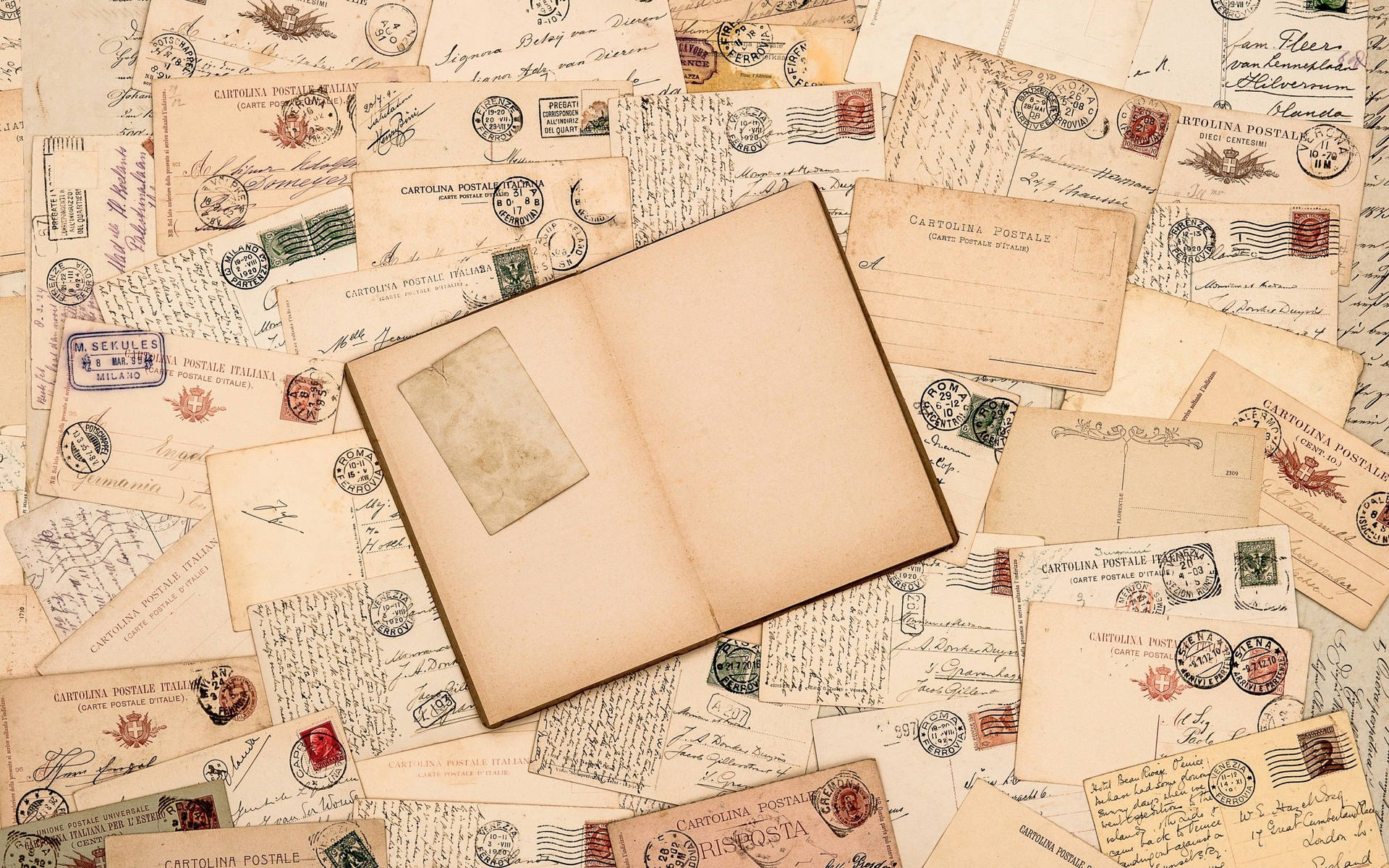 Stamps with notebook and letters vintage wallpaper