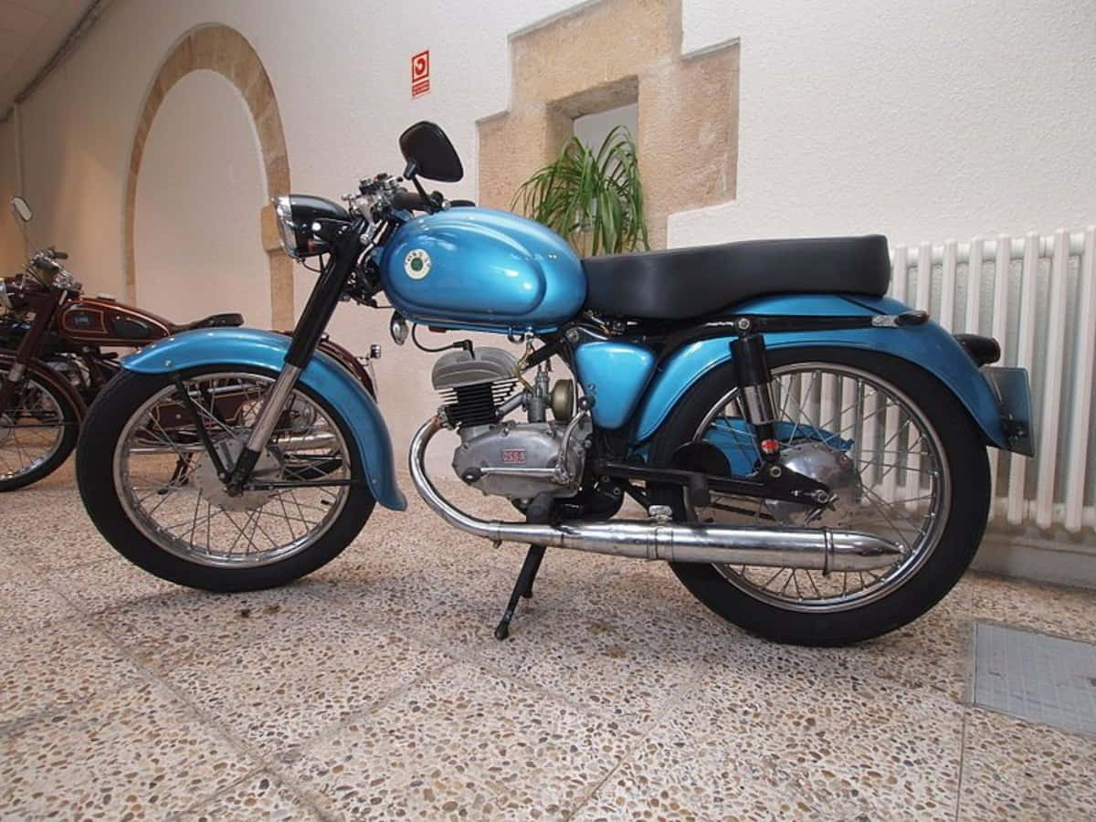 Vintage Ossa Motorcycle Exhibit Wallpaper