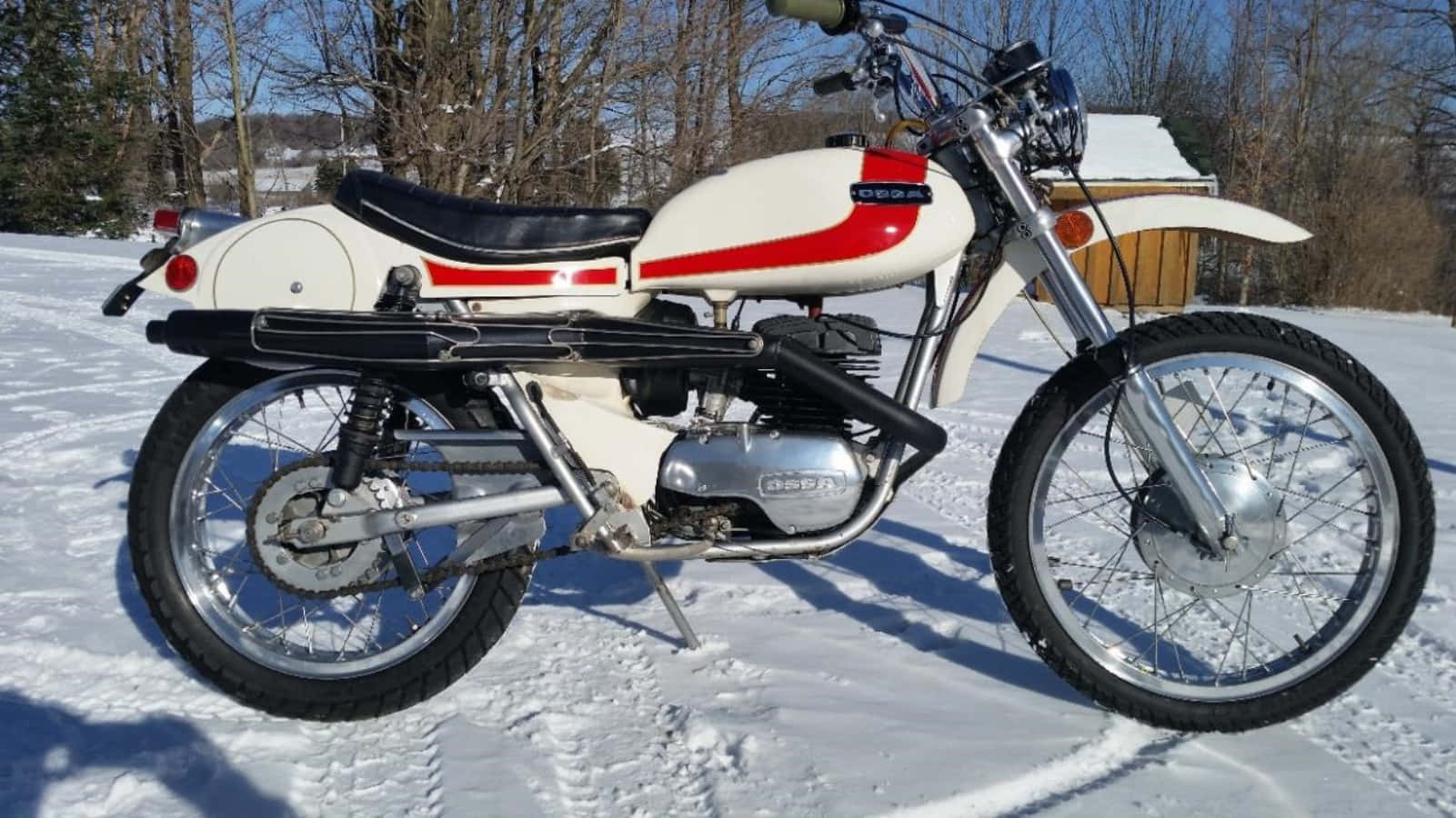 Vintage Ossa Motorcyclein Snow Wallpaper