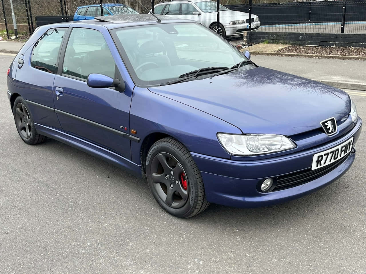 Vintage Peugeot 306 In Pristine Condition Wallpaper