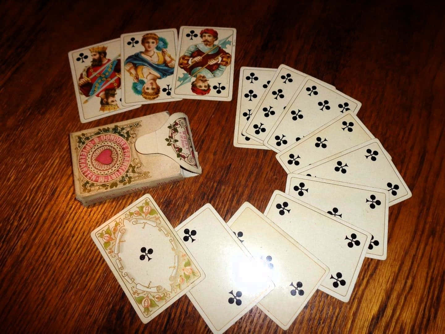 Vintage Playing Cardson Wooden Table Wallpaper