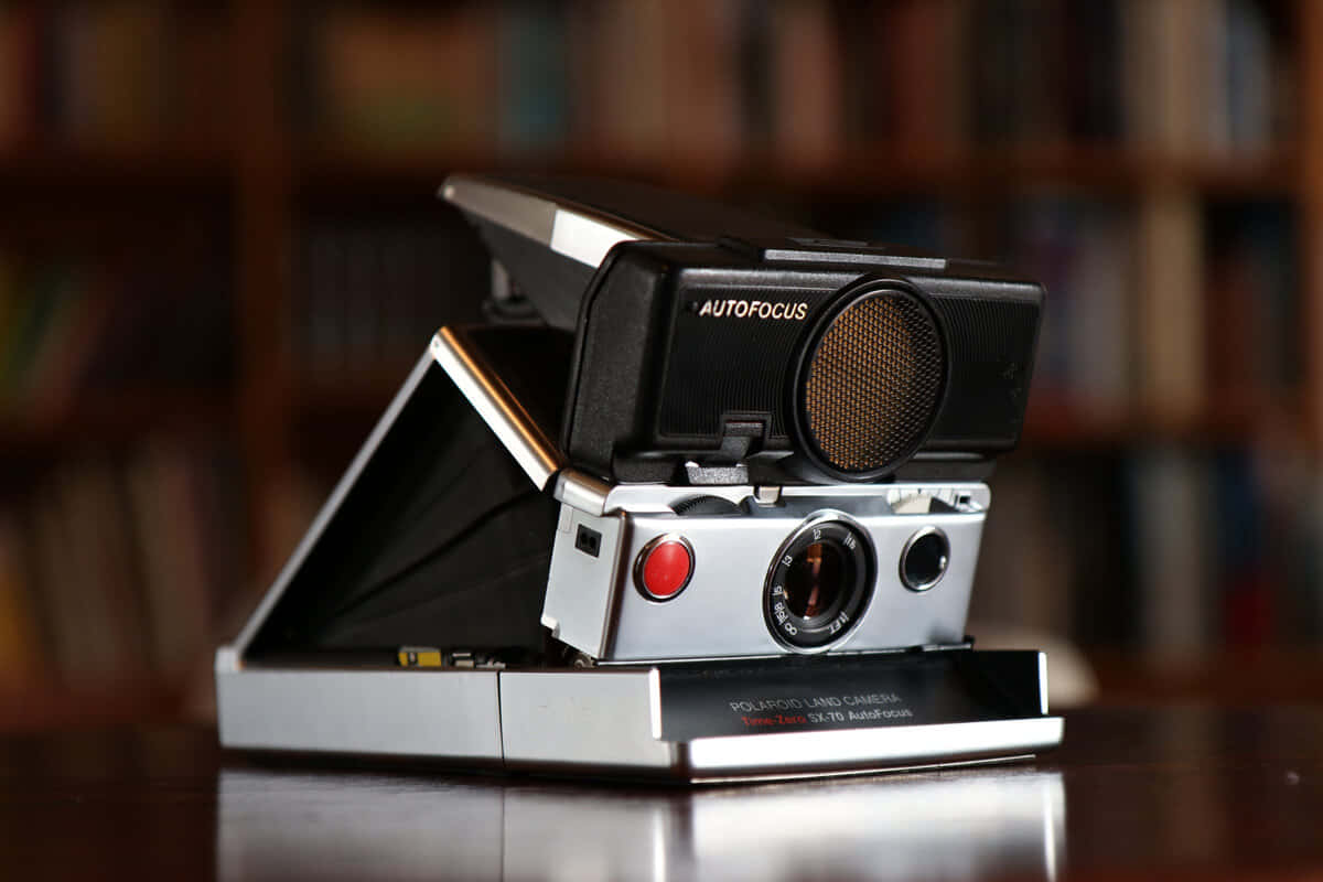 Vintage Polaroid Camera Op Bureau Achtergrond