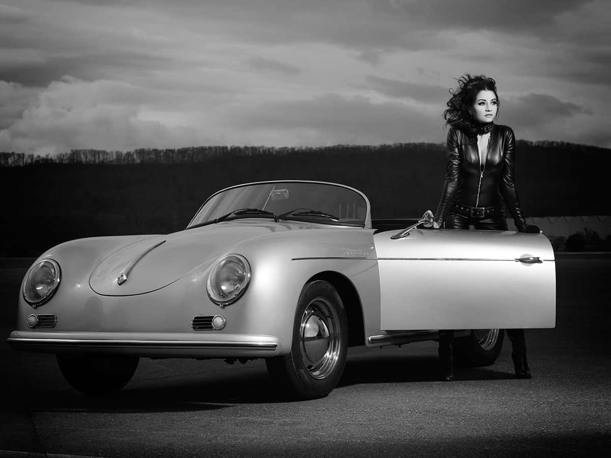 Vintage Porsche 356: A Statement In Speed And Elegance Wallpaper