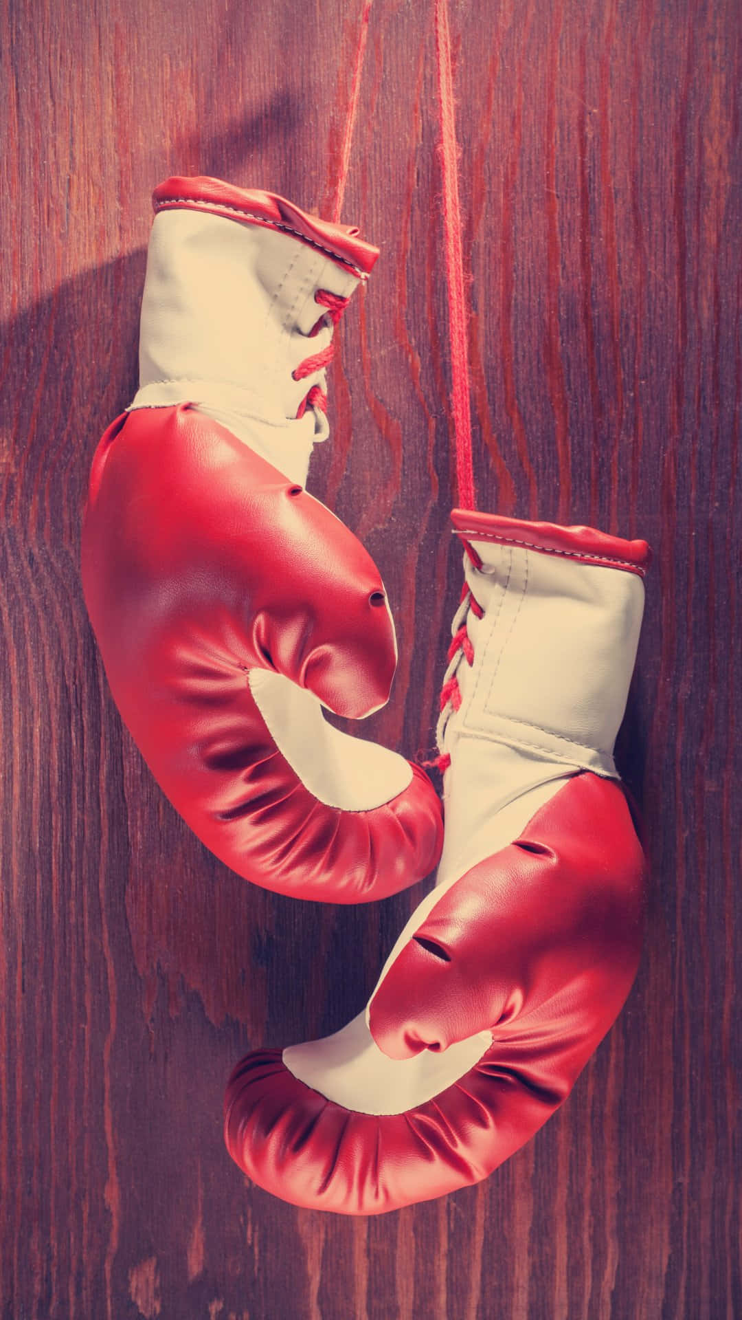 Vintage Red Boxing Gloves Wooden Background Wallpaper