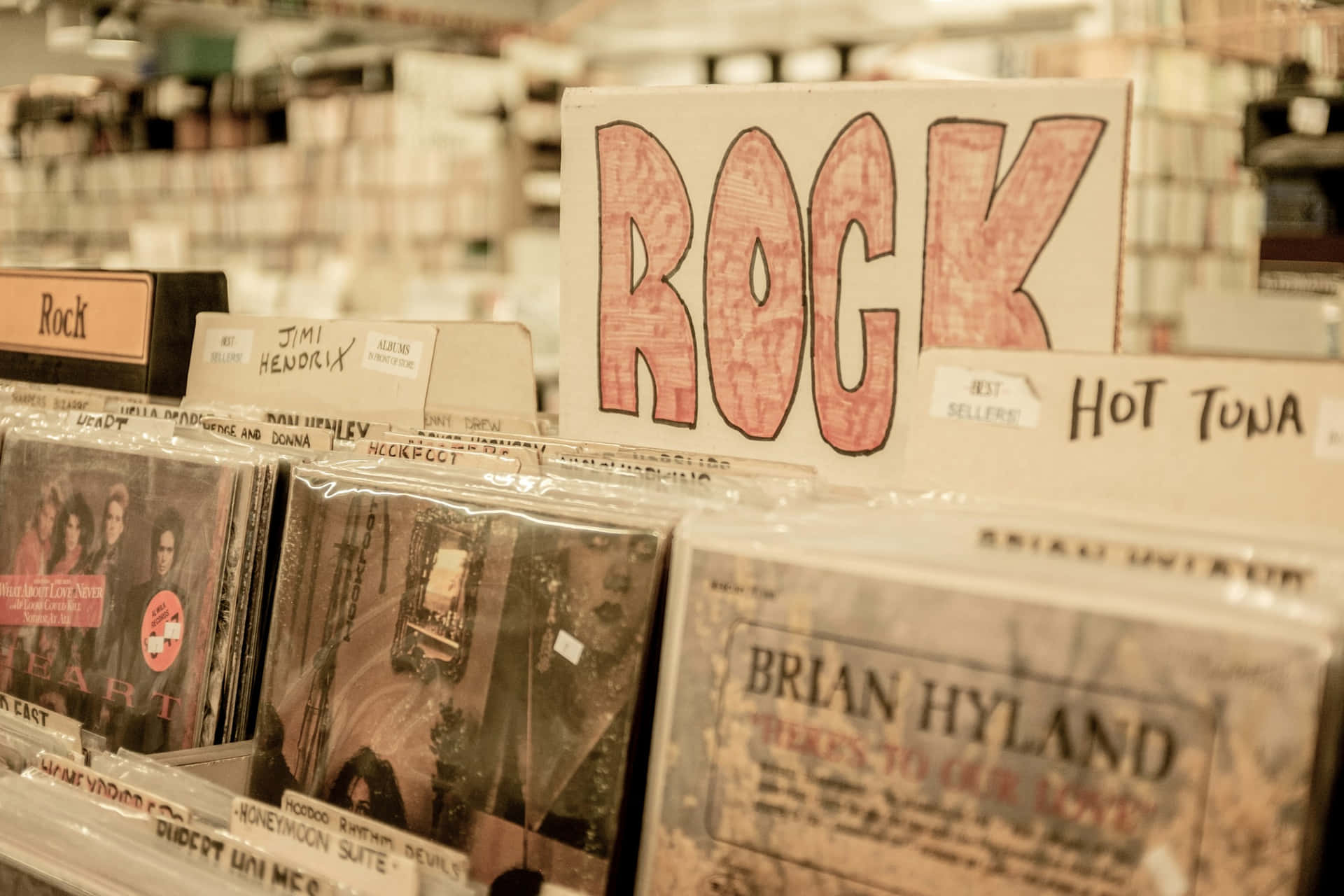 Vintage Rock Record Shop Scene Wallpaper