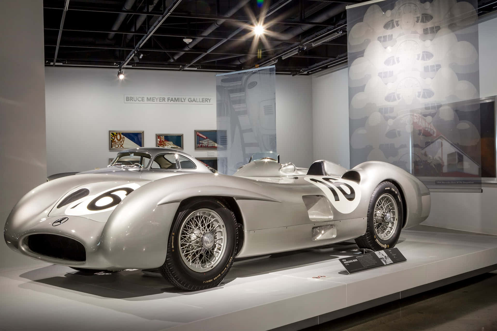 Vintage Silver Racecar Petersen Automotive Museum Wallpaper