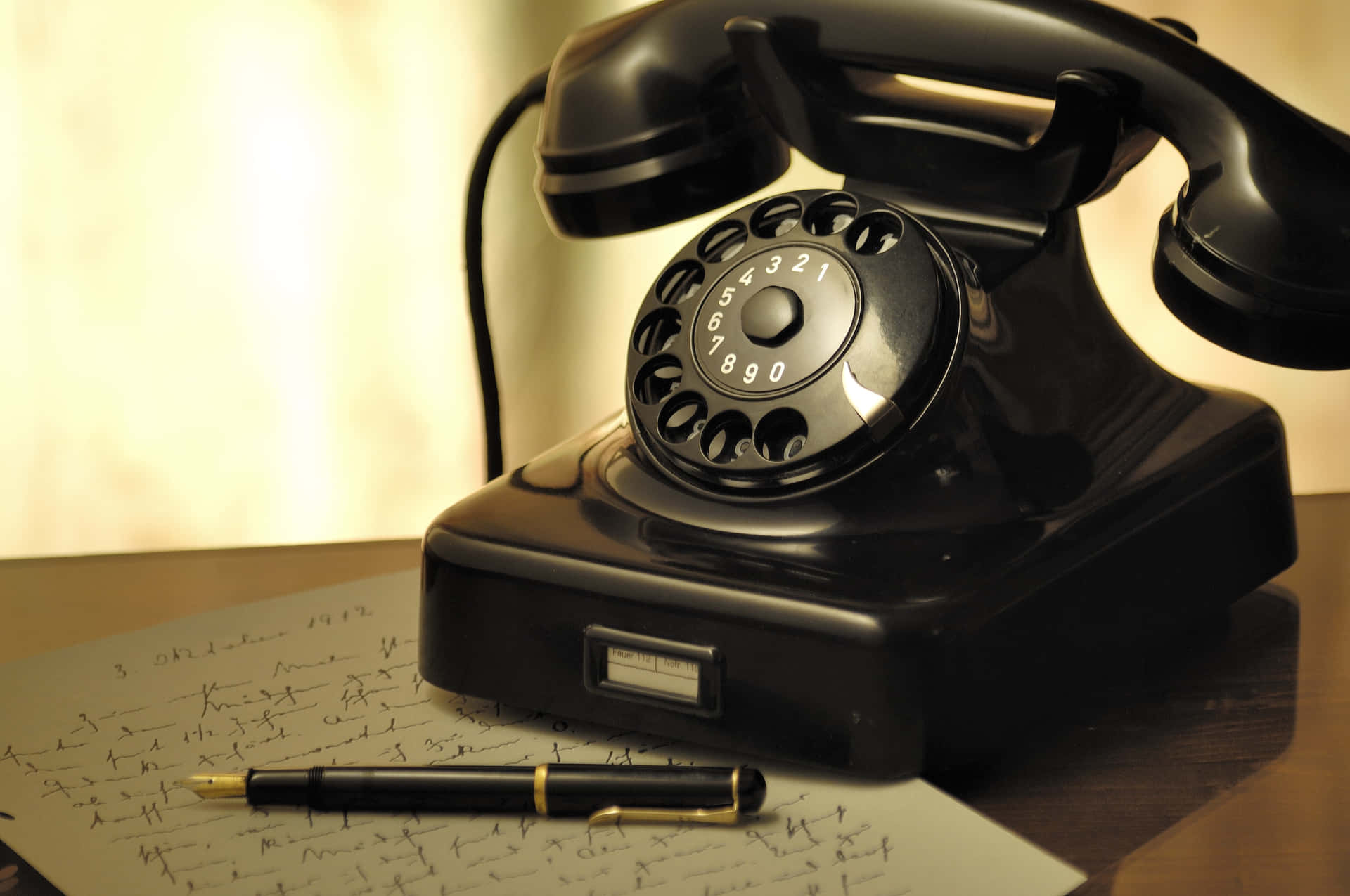 Vintage Telephoneand Penon Desk.jpg Wallpaper