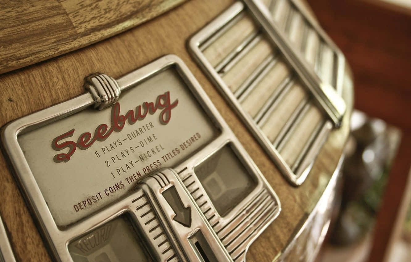Vintage Timeless Jukebox In A Comfortable Setting Wallpaper