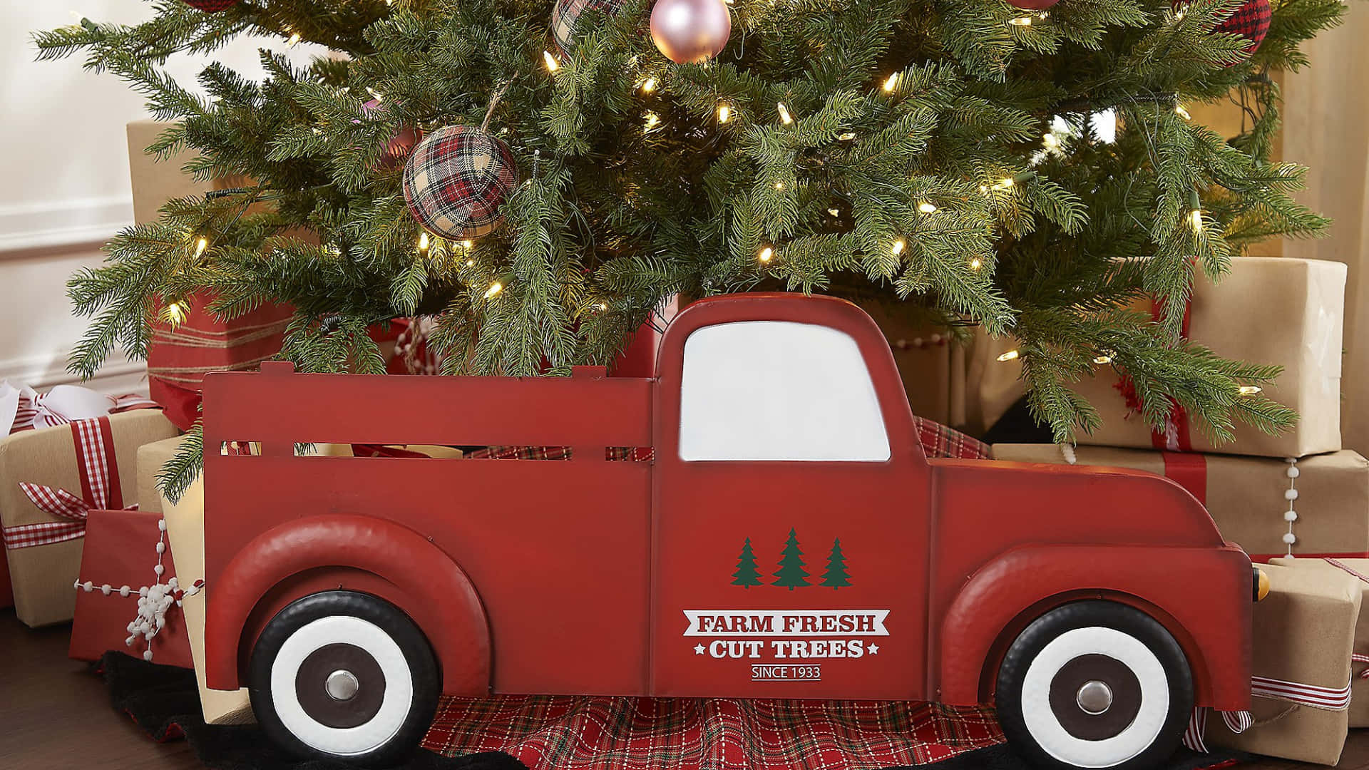 A Vintage Truck Basking in the Glow of Christmas Wallpaper