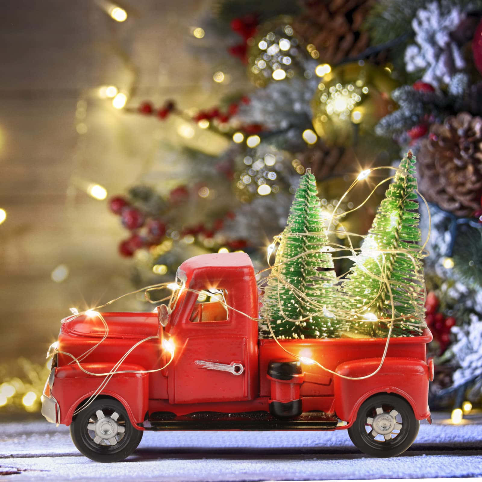 A nostalgic look back over the holidays with a bright, vintage truck. Wallpaper