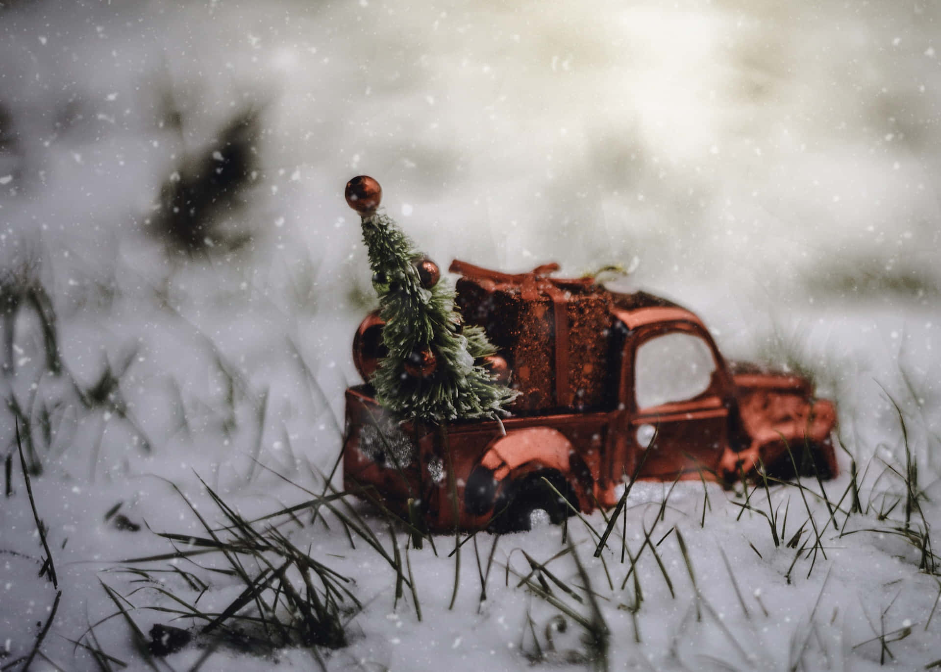 A vintage pickup truck decorated for Christmas. Wallpaper