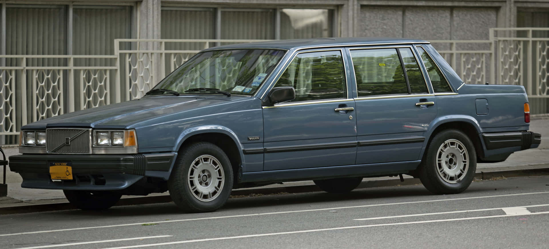 Vintage Volvo 740 Gliding On The Highway Wallpaper