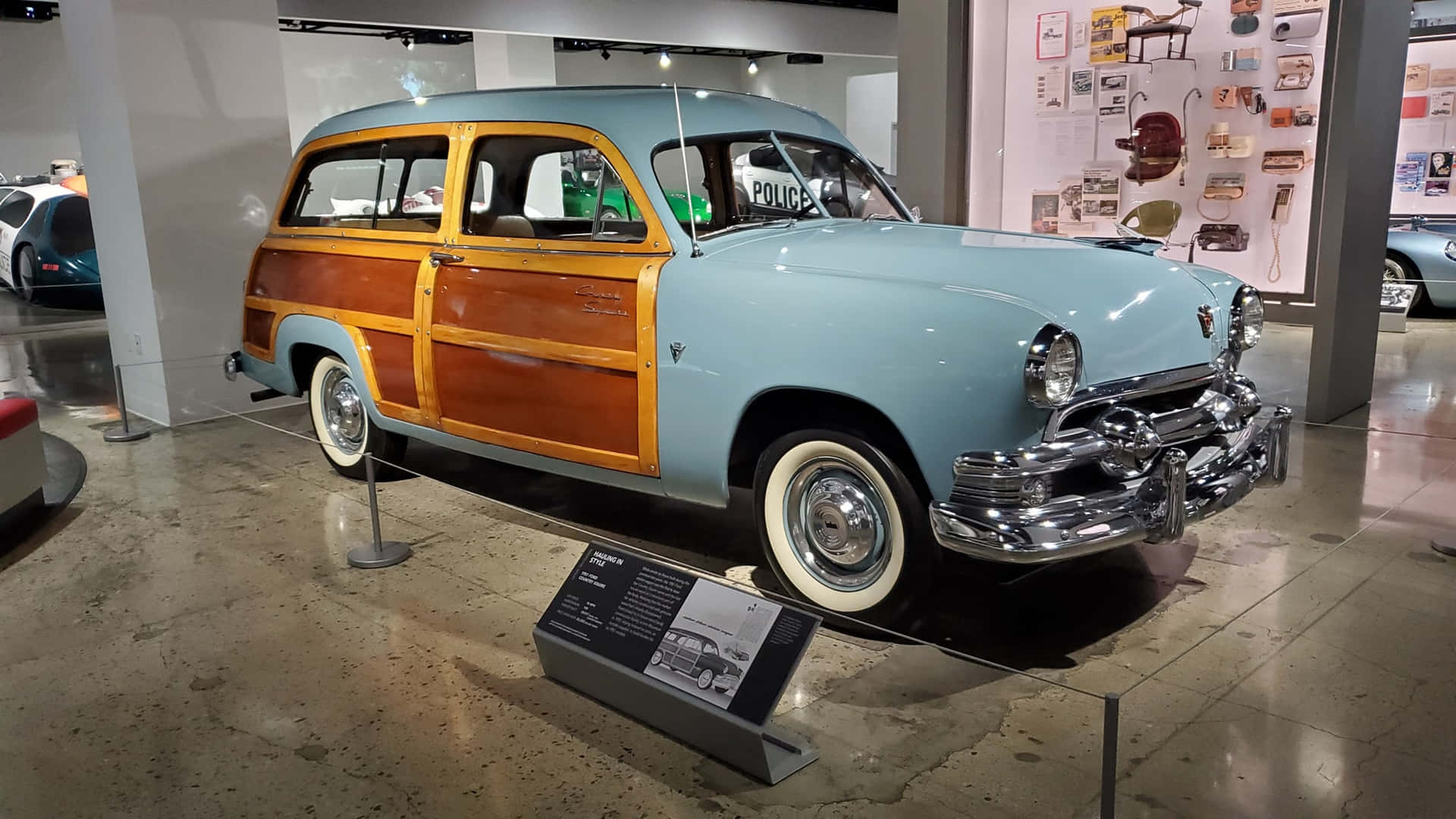 Vintage Wood Paneled Station Wagon Petersen Automotive Museum Wallpaper