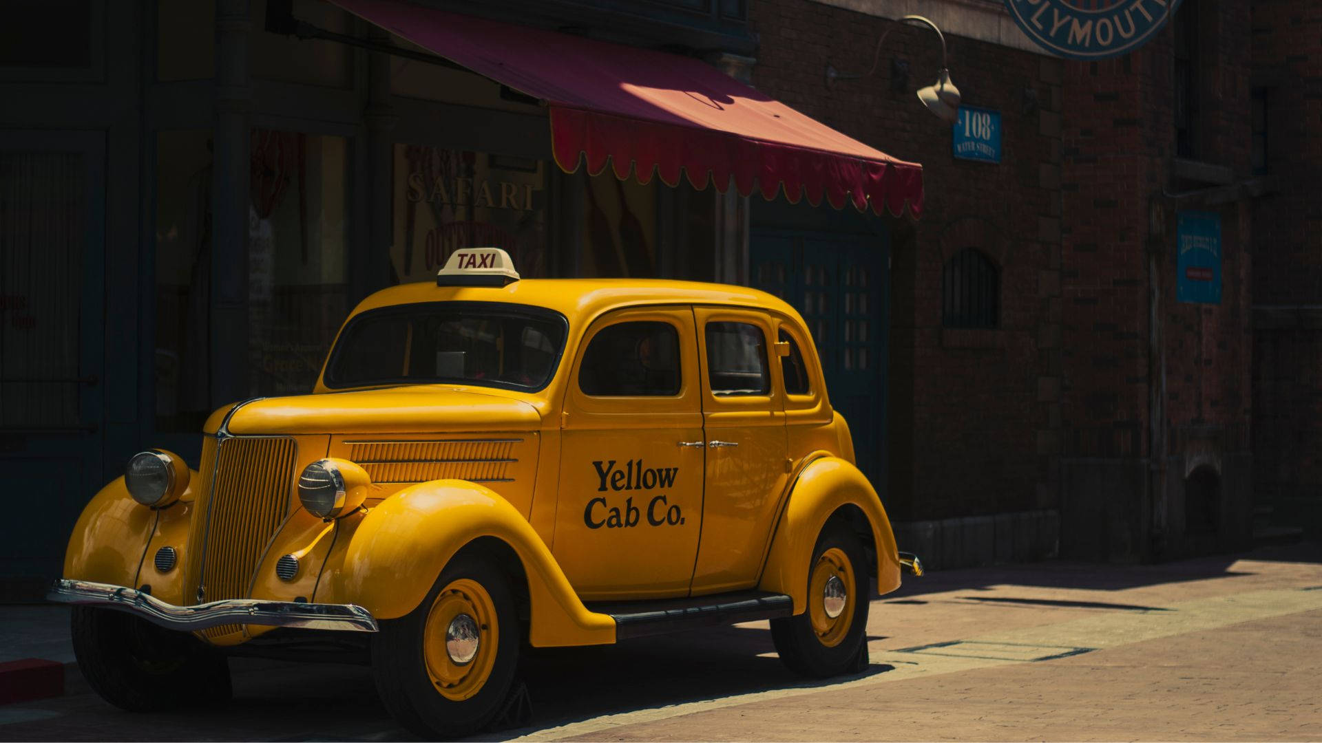 Parcheggiovintage Di Taxi Yellow Cab Sfondo