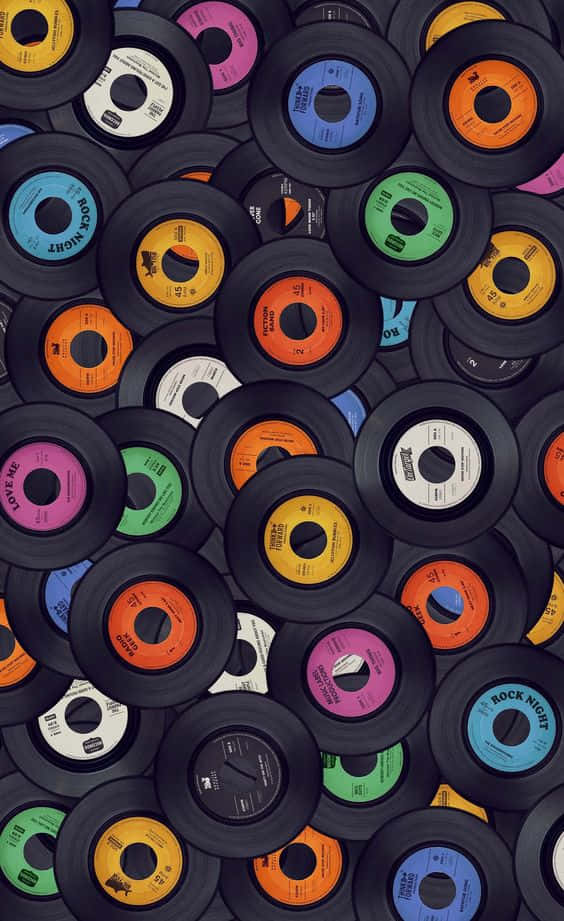 Vinyl plade baggrund - en samling af farverige vinylplader Wallpaper