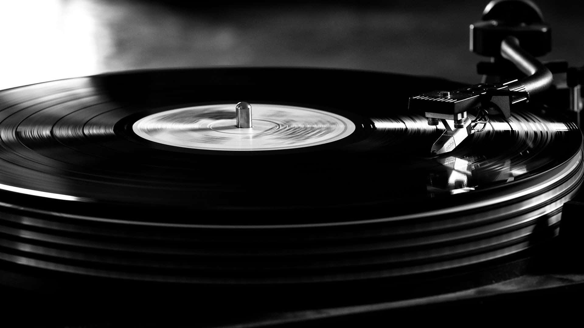 Vinyl Record Being Played On A Turntable Wallpaper