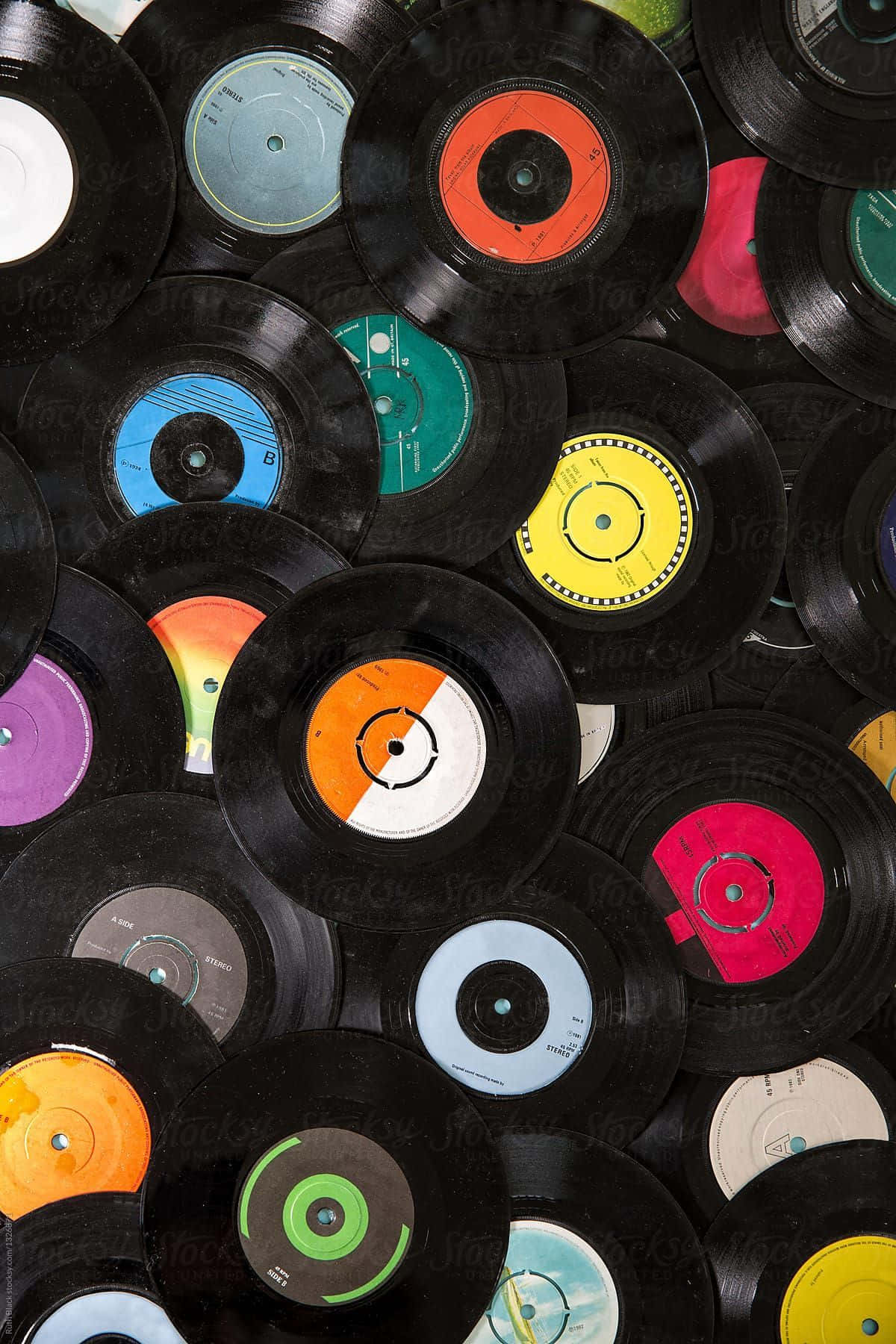 En bunke af vinylplader, der giver liv til din skrivebord. Wallpaper