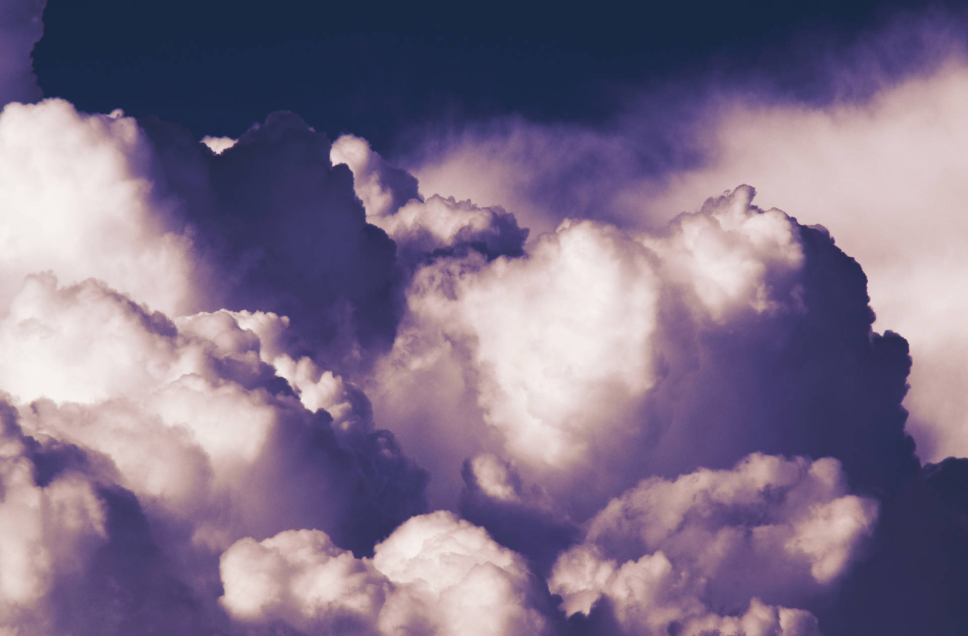 Violet Fluffy Clouds Wallpaper