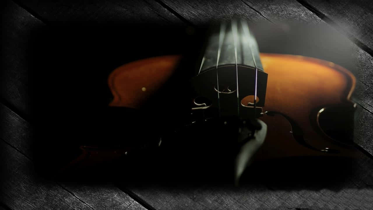 En violin leverer skønhed, elegance og lethed til enhver koncert. Wallpaper